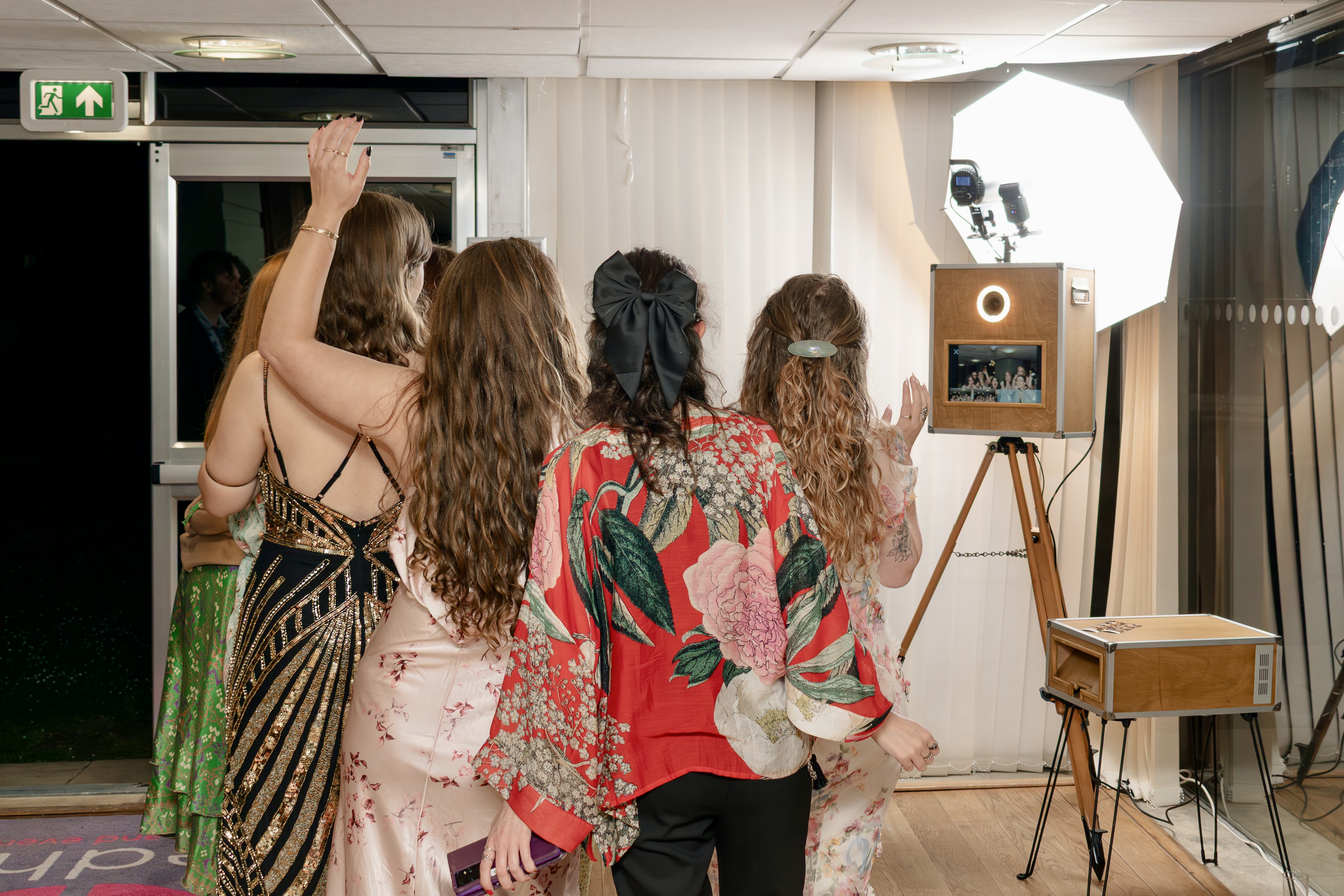 Guests gathered around the unimoments pod at a live event