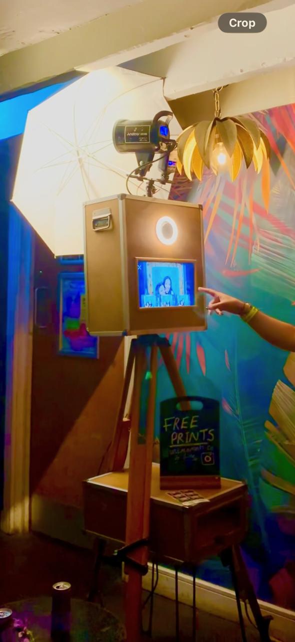 unimoments selfie pod set up at a live event, ring light glowing
